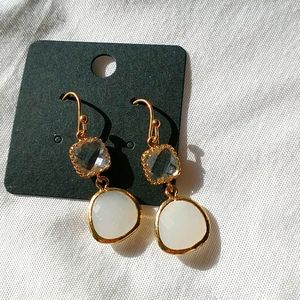 Gold dangling moonstone earrings